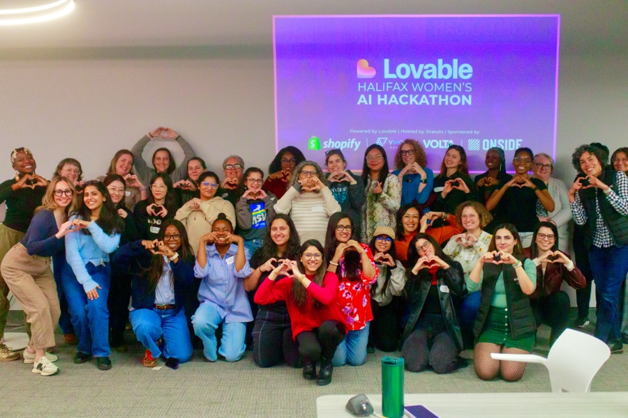 Group photo from the women's AI hackathon with Lovable